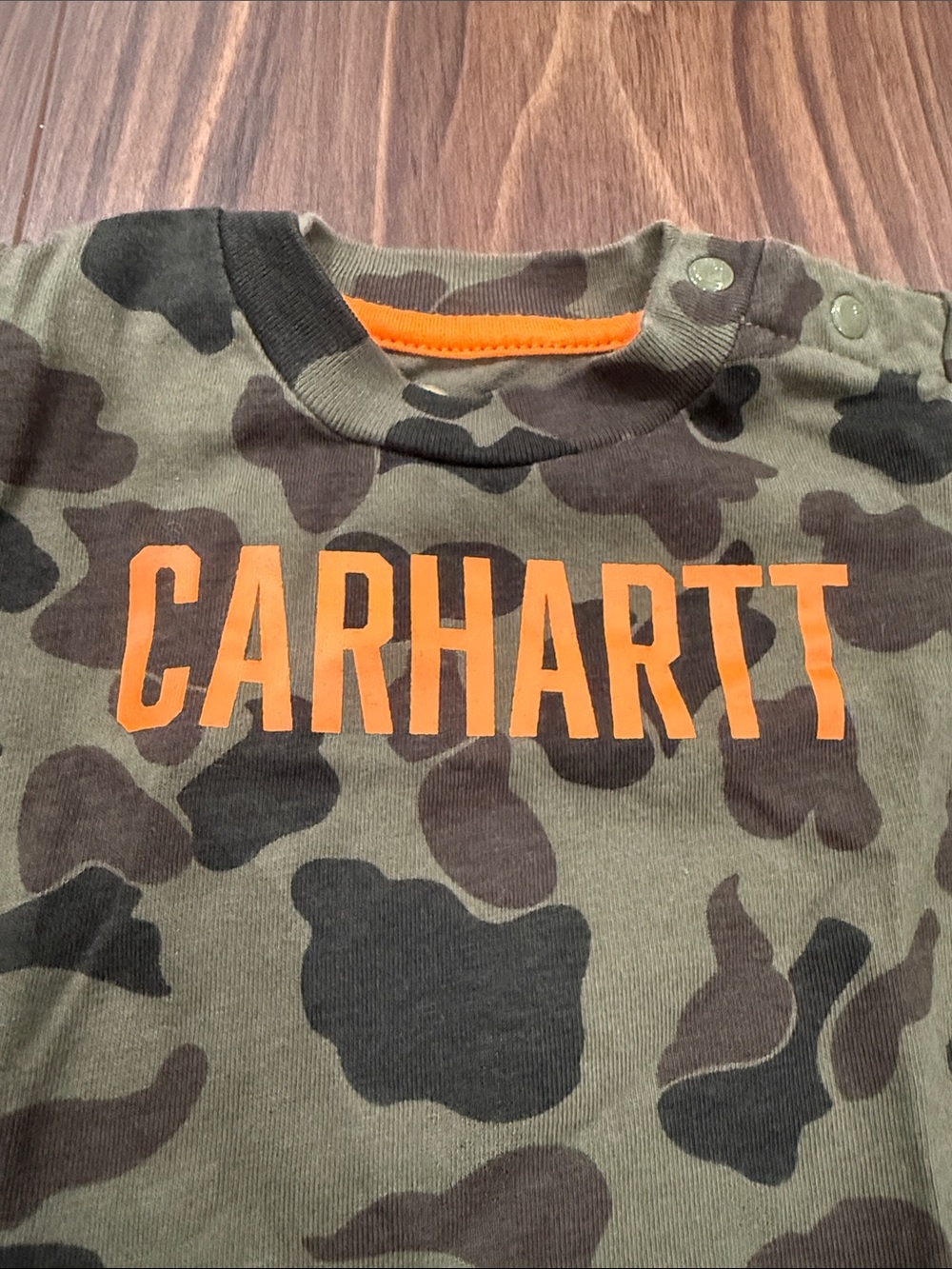 Carhartt Olive and Black Camo Baby Bodysuit with Orange Logo - Picture 2 of 6